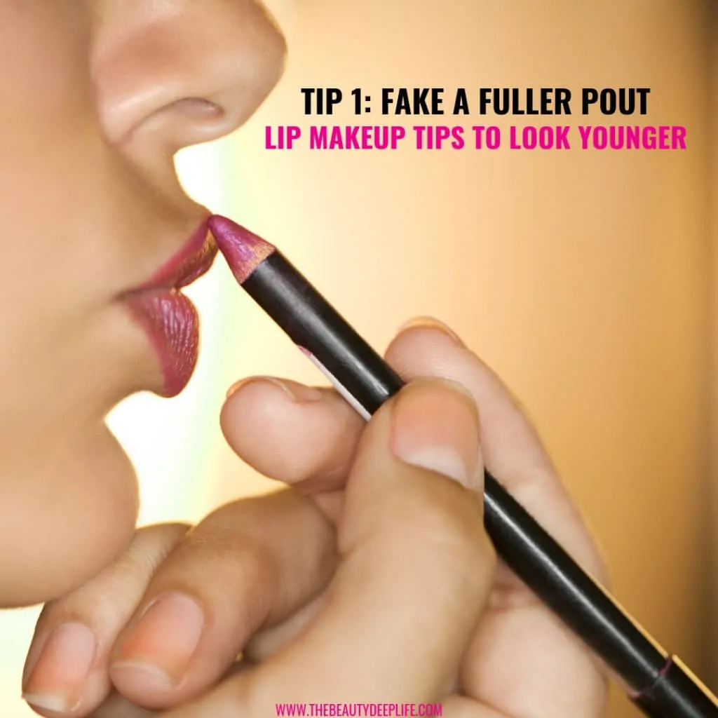 Woman applying using a lip pencil with text overlay - Tip 1 Fake Fuller Pout Lip Makeup Tips To Look Younger