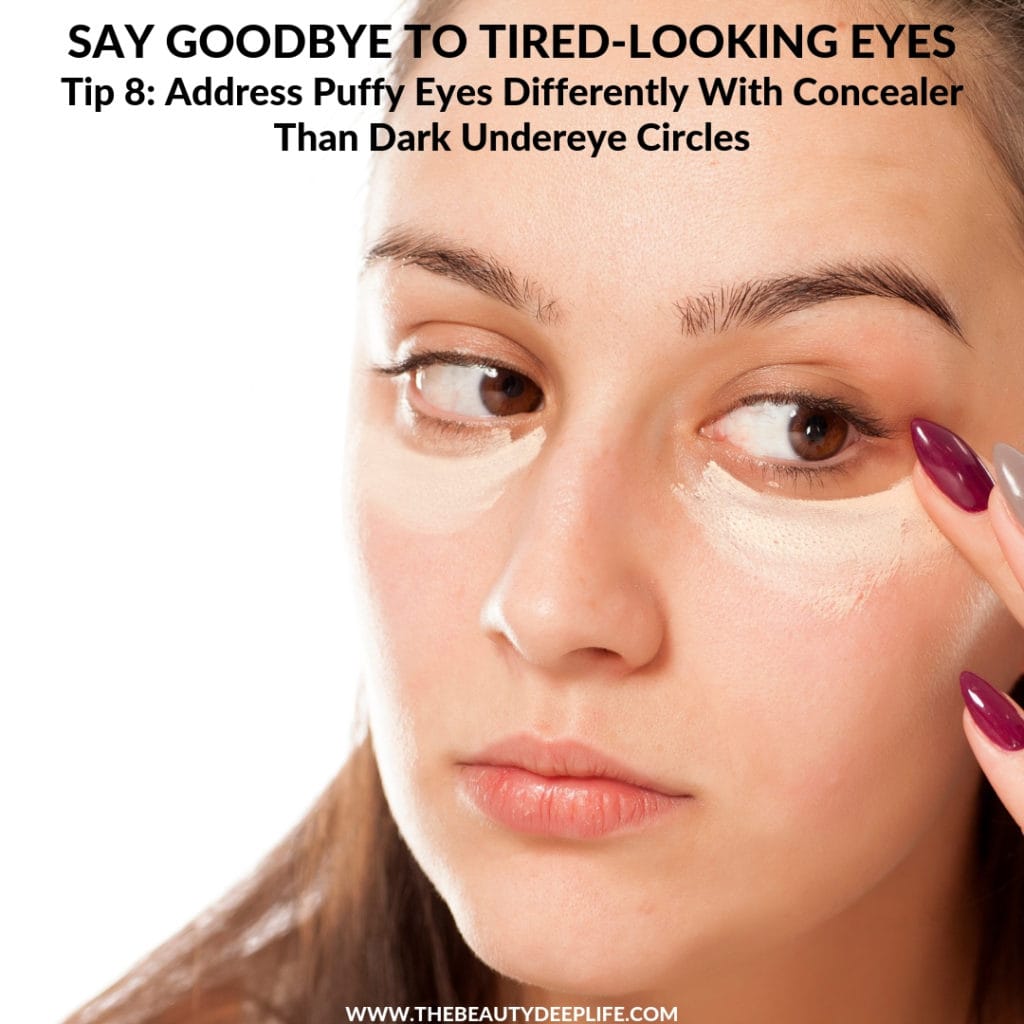 Woman applying concealer makeup with text overlay - Say Goodbye to Tired-Looking Eyes