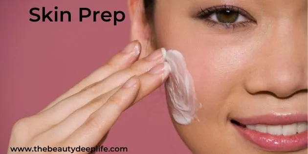 Woman applying moisturizer to skin as she preps her skin for makeup