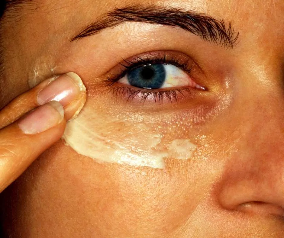 woman applying eye cream for her skincare routine