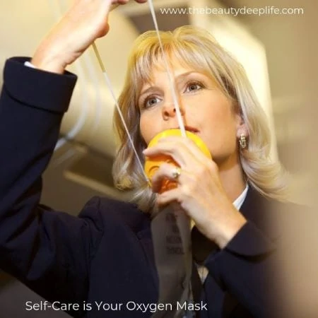Woman in plane using oxygen mask