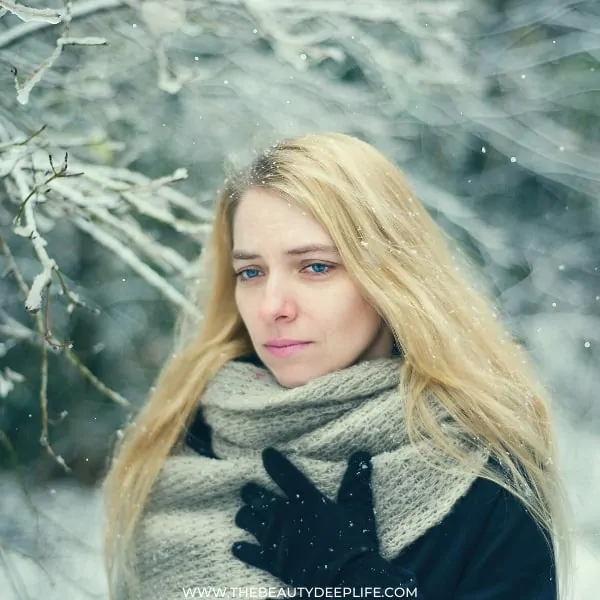 woman with dry hair outside in the winter cold weather