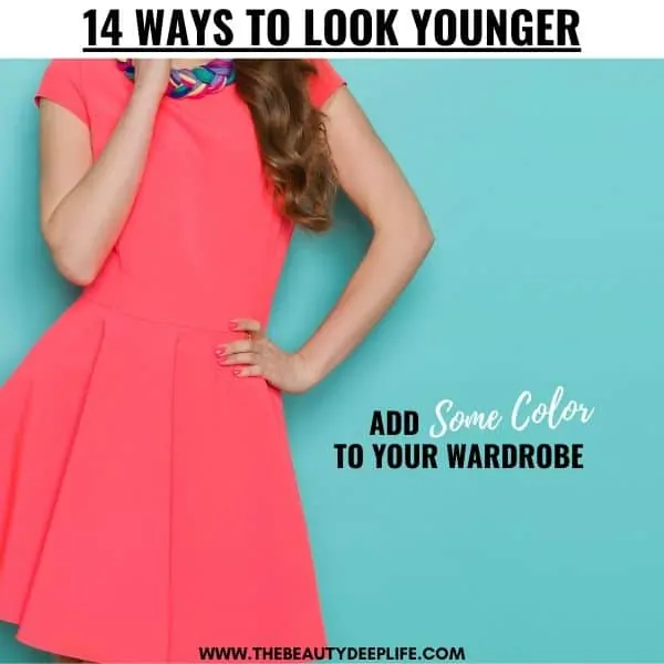 woman in a bright colored dress with text overlay 14 ways to look younger add some color to your wardrobe