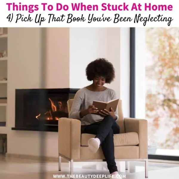 woman reading a book while stuck at home
