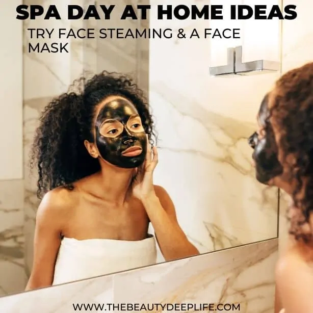 woman applying a face mask with text overlay spa day at home ideas try face steaming and a face mask
