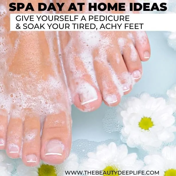 woman's feet in soapy water 