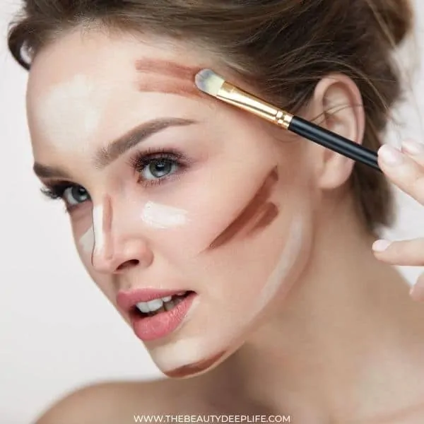 woman contouring her face