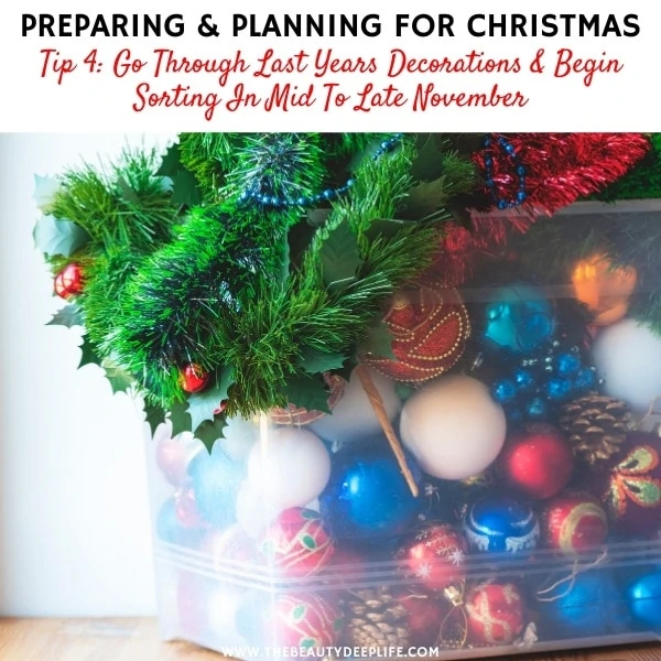 Christmas decorations in a storage box with text overlay preparing and planning for christmas