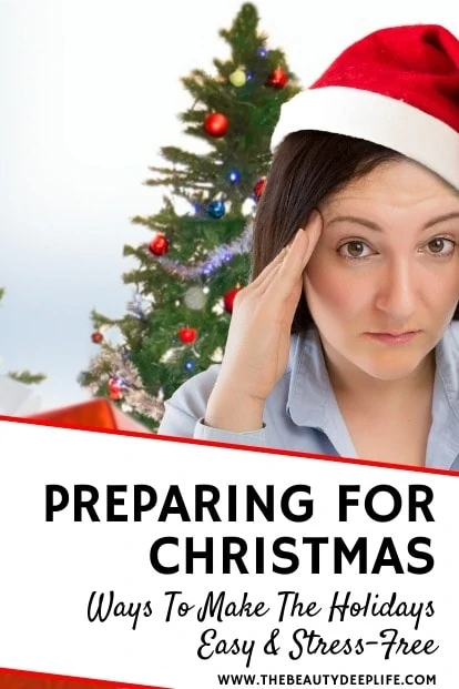 woman looking stressed out infront of Christmas tree with text overlay preparing for Christmas ways to make the holidays easy and stress-free