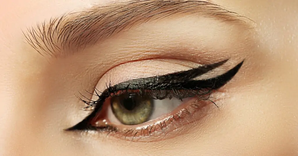 woman's eye with black eyeliner makeup