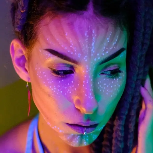 woman with avatar halloweeen makeup
