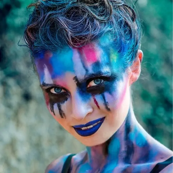 woman with colorful halloween makeup