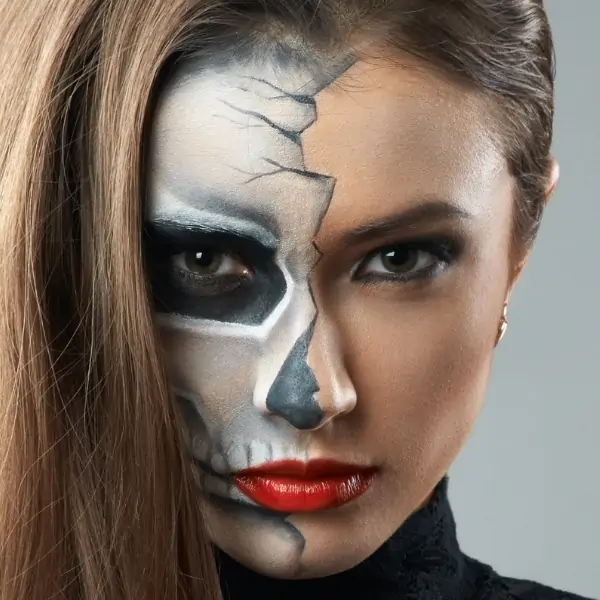 woman with half skeleton makeup look for halloween