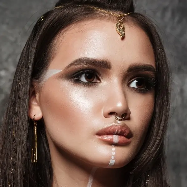 woman with warrior makeup