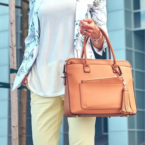 stylish mom holding a fashionable bag