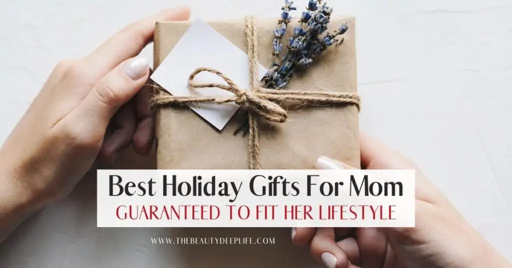woman's hands holding a present with text overlay - best holiday gifts for mom guaranteed to fit her lifestyle