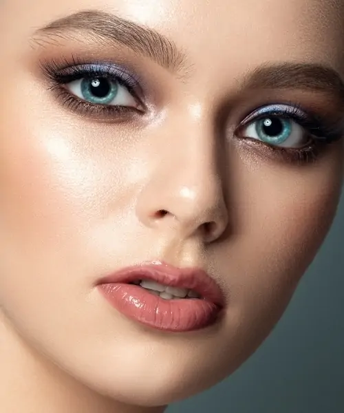 woman with blue eyes and multi-color eye makeup look