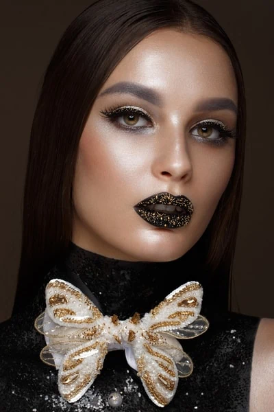 woman with a beautiful gothic halloween makeup look