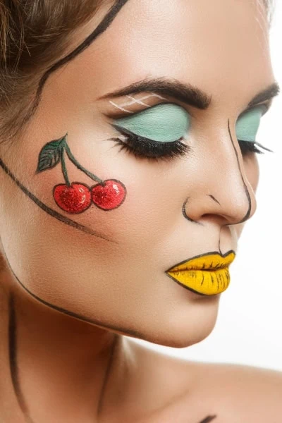 woman's face with a pop art halloween makeup look