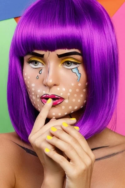 woman with comic book pop art makeup look for halloween