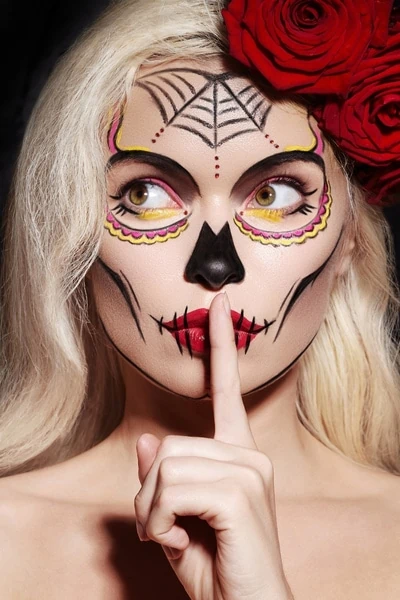 woman with a sugar skull makeup look