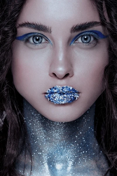 woman with ice queen halloween makeup look
