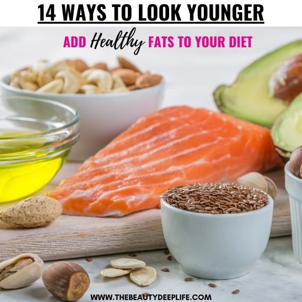 examples of healthy fats like salmon and avocado wirh text overlay 14 ways to look younger