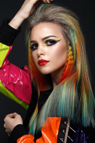 woman with bright colorful creative makeup