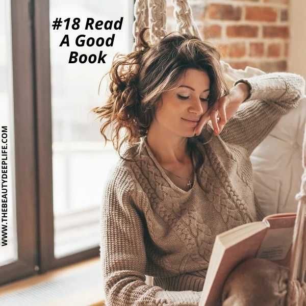 woman showing how to pamper yourself by reading a good book