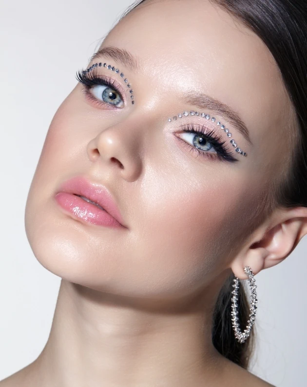 woman with a rhinestone makeup look for summer