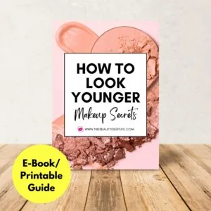 how to look younger makeup secrets book on wood floor with text overlay e-book printable guide