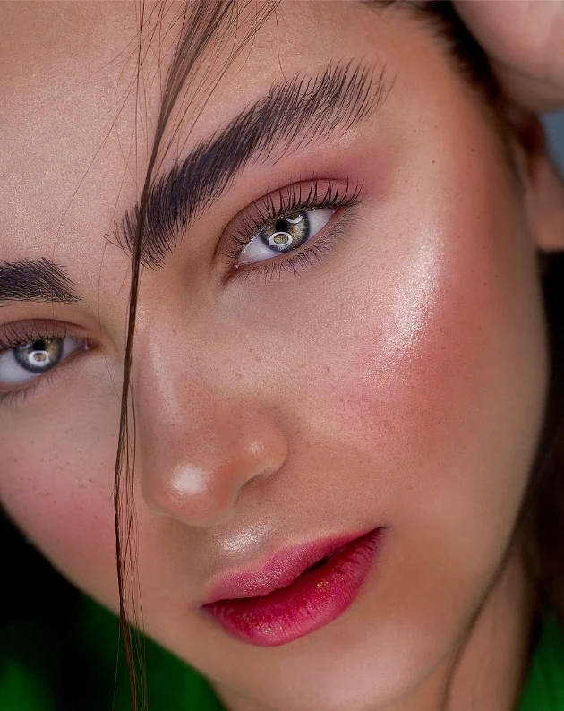 woman with glowing summer makeup look