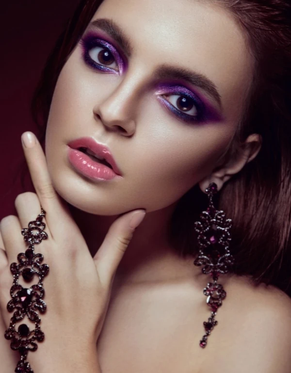woman with a dramatic purple eyeshadow look
