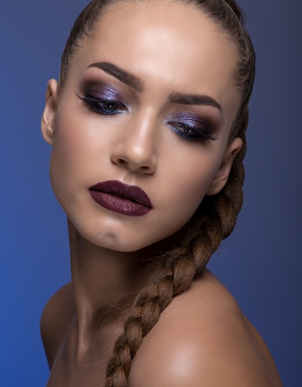 woman with a sparkly purple eyeshadow look