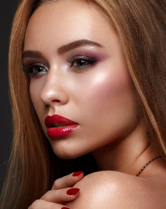 woman with berry eyeshadow and red lipstick