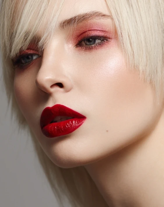 woman with red eyeshadow and red lipstick