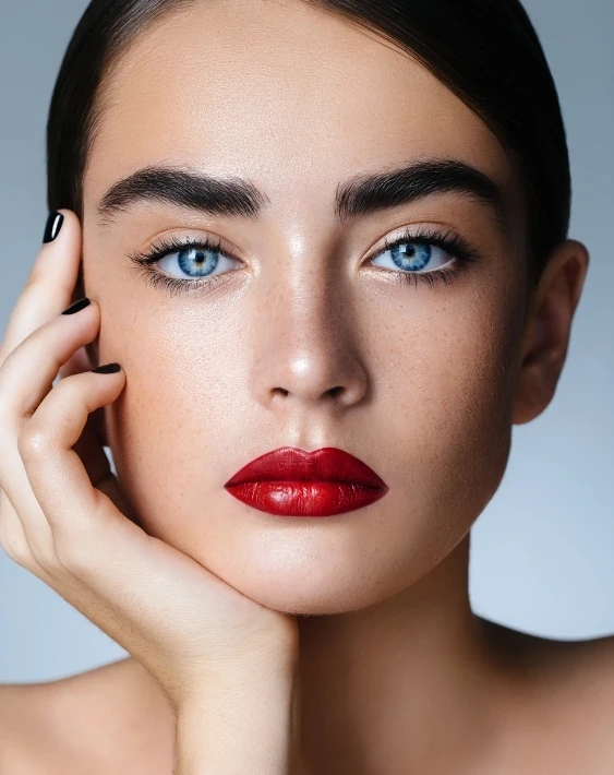 young woman with natural makeup and red lips