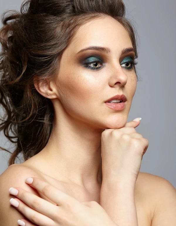 woman with hazel eyes and a brown and green eyeshadow look