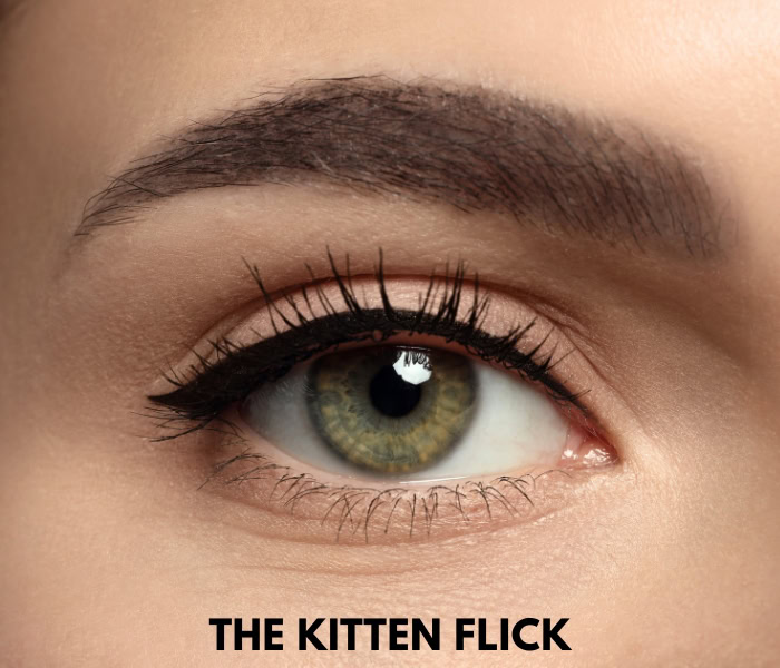 woman's eye with kitten eyeliner flick look
