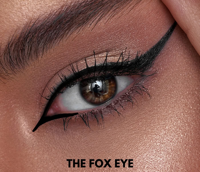 woman with a fox eye makeup look