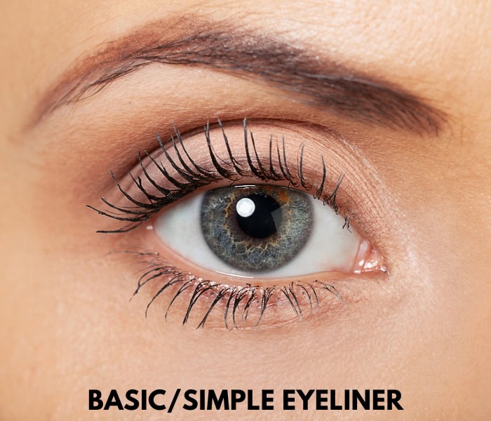 woman with a basic eyeliner style using brown pencil eyeliner