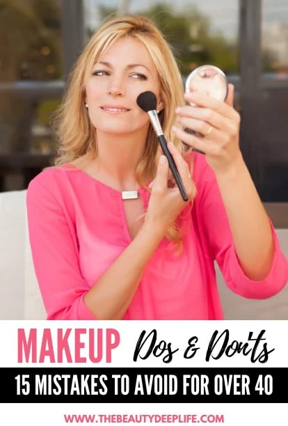 woman over 40 applying blush makeup to her face