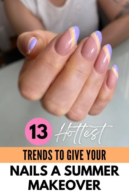 woman's hand with bright colorful pink, purple, and yellow nails