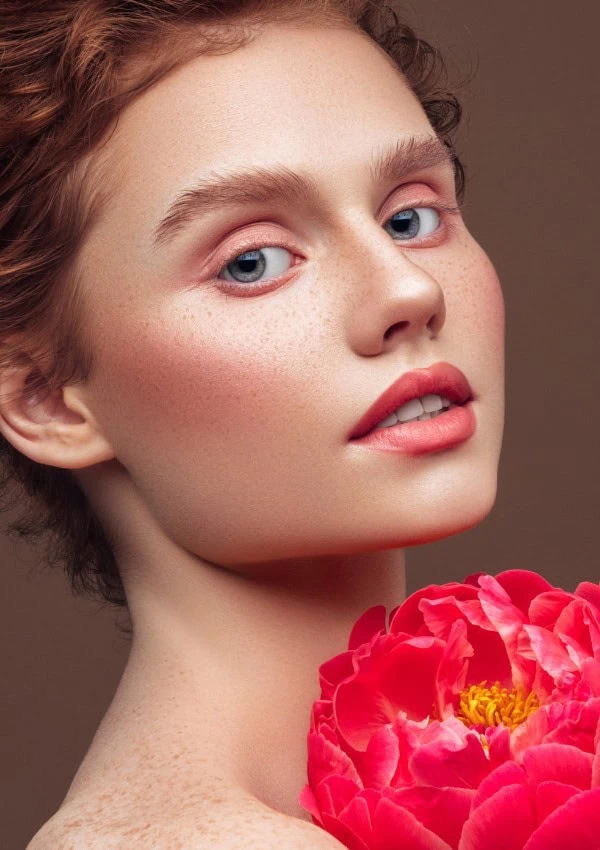 young woman with a soft monochrome makeup look for spring