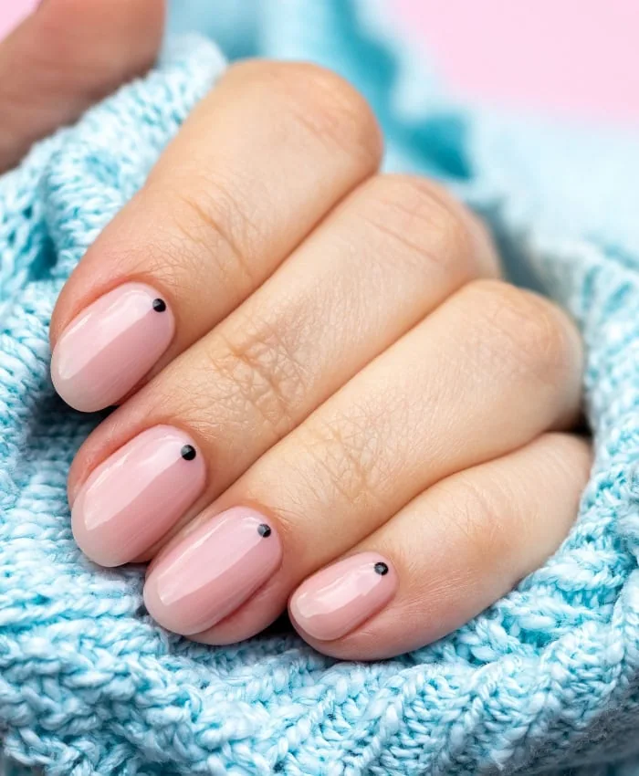 minimalist pink spring nail ideas with black dots