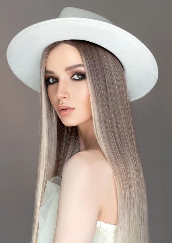 young woman with long ash blonde hair color