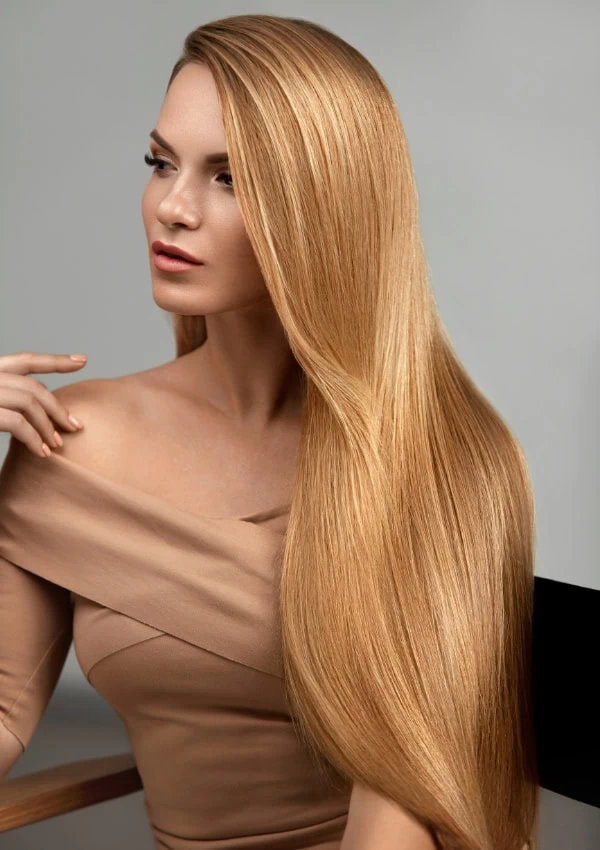 woman with a long honey blonde hair color
