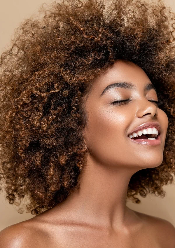 African American Woman With Caramel Blonde Hair Color