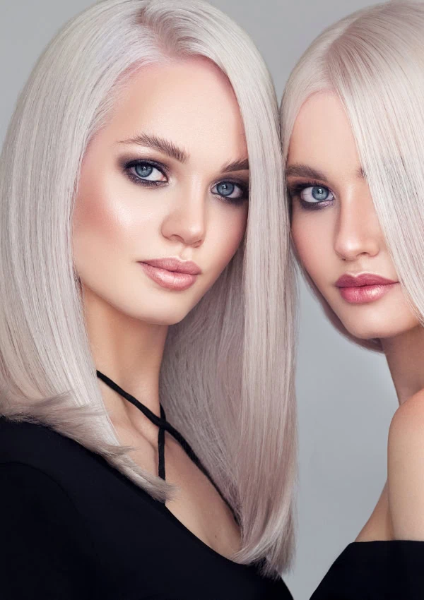 two beautiful women with icy blonde hair