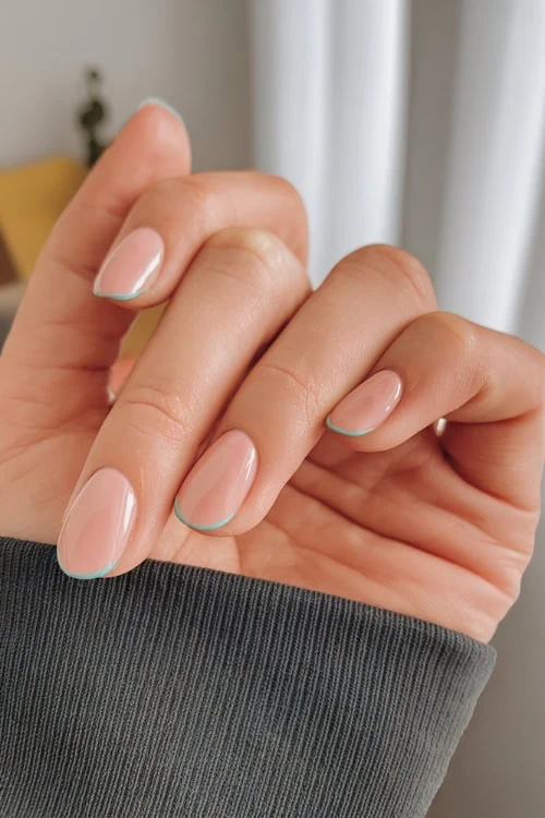 hand with micro-tip french nails